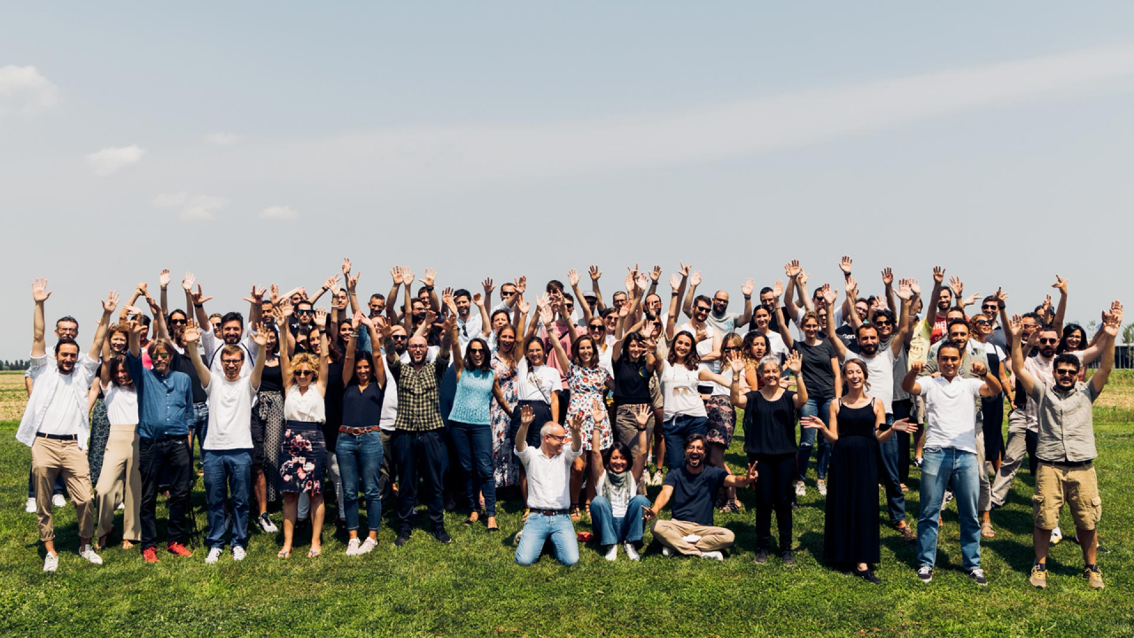 Outdoor group photo of the team